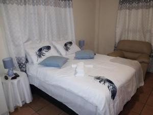MulMas Guest House客房内的一张或多张床位