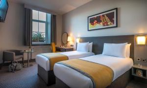 贝尔法斯特国际机场马尔丹酒店客房内的一张或多张床位