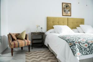 帕拉克玛尔姆乐斯公寓式酒店客房内的一张或多张床位