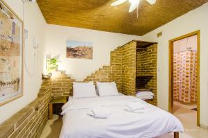 斯维里穆巴米德巴尔沙漠路线客栈客房内的一张或多张床位