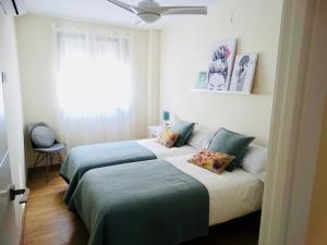 Apartamento El Barranco客房内的一张或多张床位