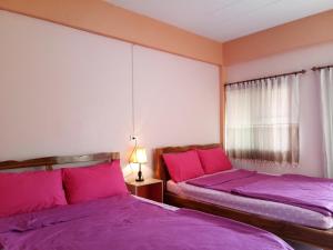考科盘根旅馆客房内的一张或多张床位