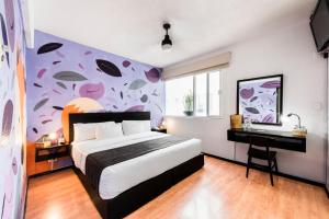姆帕拉魁塔和酒店客房内的一张或多张床位