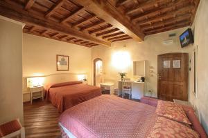 Hotel Villa San Michele客房内的一张或多张床位