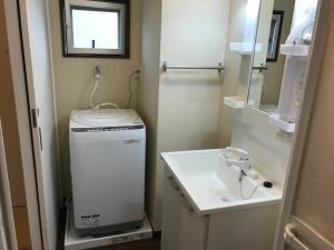 宜野湾每周港口景公寓的一间浴室