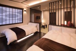 筑后川温泉清乃屋日式旅馆客房内的一张或多张床位