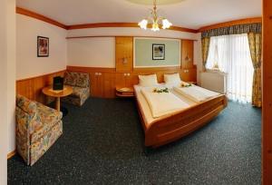 菲林茵维尔特尔酒店客房内的一张或多张床位