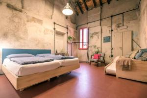Un posto a Milano - guesthouse all'interno di una cascina del 700客房内的一张或多张床位