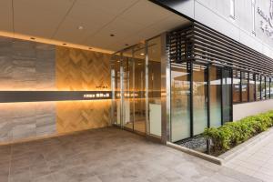 仙台海滨通多米快捷酒店 