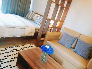 Rangsit Residence客房内的一张或多张床位