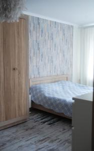 Бело-голубая безмятежность客房内的一张或多张床位