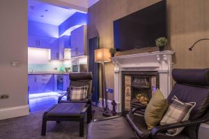 West Highland Apartments Milngavie - The Lomond的休息区