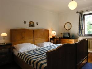 豪斯瓦顿伯格酒店客房内的一张或多张床位