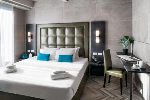 米兰斯派斯酒店客房内的一张或多张床位