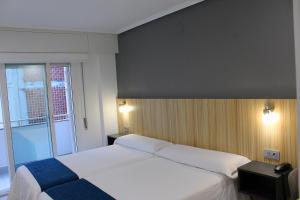 奥特里亚纳酒店客房内的一张或多张床位