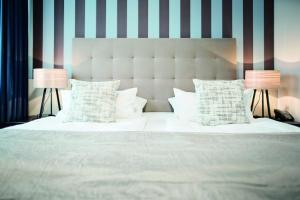 博塞城市酒店客房内的一张或多张床位