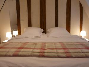 Domaine de Malitourne客房内的一张或多张床位