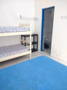 Apartamentos Águia Azul客房内的一张或多张双层床