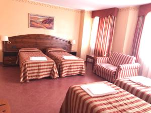 阿尔卑斯旅馆客房内的一张或多张床位