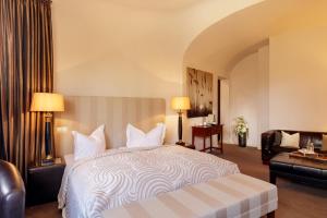 卡佐宫殿酒店客房内的一张或多张床位