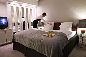 蒙克博库洛酒店客房内的一张或多张床位