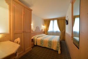 Hotel Dalla Serra客房内的一张或多张床位