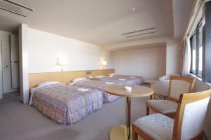 神户珍珠城市饭店客房内的一张或多张床位