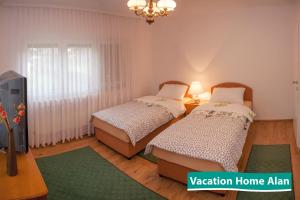 Vacation home Alan客房内的一张或多张床位