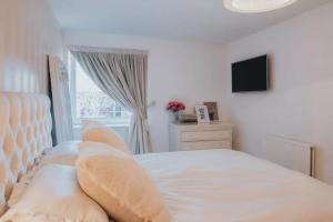 Spacious Flat Near Murrayfield - Sleeps 4客房内的一张或多张床位