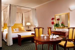 贝尔基耶利酒店客房内的一张或多张床位