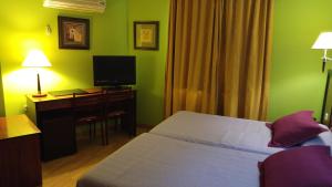 卡瓦尼亚斯酒店客房内的一张或多张床位