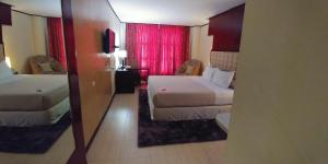 麦克坦Cebu Dulcinea Hotel and Suites-MACTAN AIRPORT HOTEL的相册照片