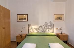 赫尔维西亚比萨塔酒店客房内的一张或多张床位