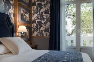 Relais & Châteaux Heritage Hotel客房内的一张或多张床位