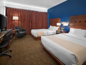 韦达米特拉酒店客房内的一张或多张床位