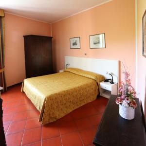 Hotel Barolo Classico客房内的一张或多张床位