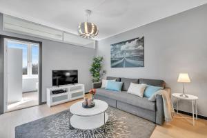 Forenom Serviced Apartments Oslo Rosenhoff的休息区