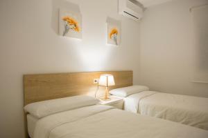 El Pinet Beach Apartment客房内的一张或多张床位