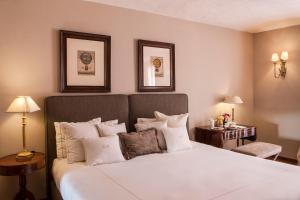 科尔特贡迪亚精品酒店客房内的一张或多张床位