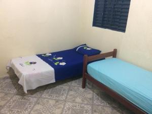 Casa Temporada em Cavalcante客房内的一张或多张床位