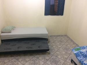 Casa Temporada em Cavalcante客房内的一张或多张床位