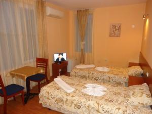 Matev Hotel客房内的一张或多张床位