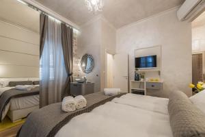 扎拉宫殿-设计旅馆客房内的一张或多张床位