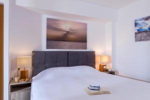 卡那匹斯塔海角酒店及套房客房内的一张或多张床位