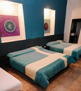 Samsara Hotel Salta客房内的一张或多张床位