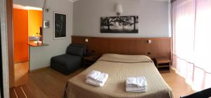 Hotel Rinaldo Apartment客房内的一张或多张床位