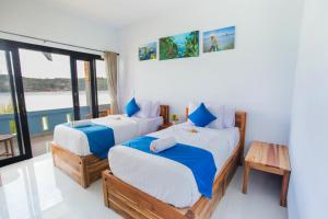 蓝梦岛极光海滩景旅馆的水景客房 - 带两张床