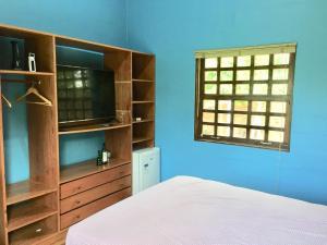 Chalé Quintal Amazon客房内的一张或多张床位