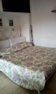 Appartamento Picasso客房内的一张或多张床位