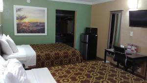休斯顿戴斯酒店客房内的一张或多张床位